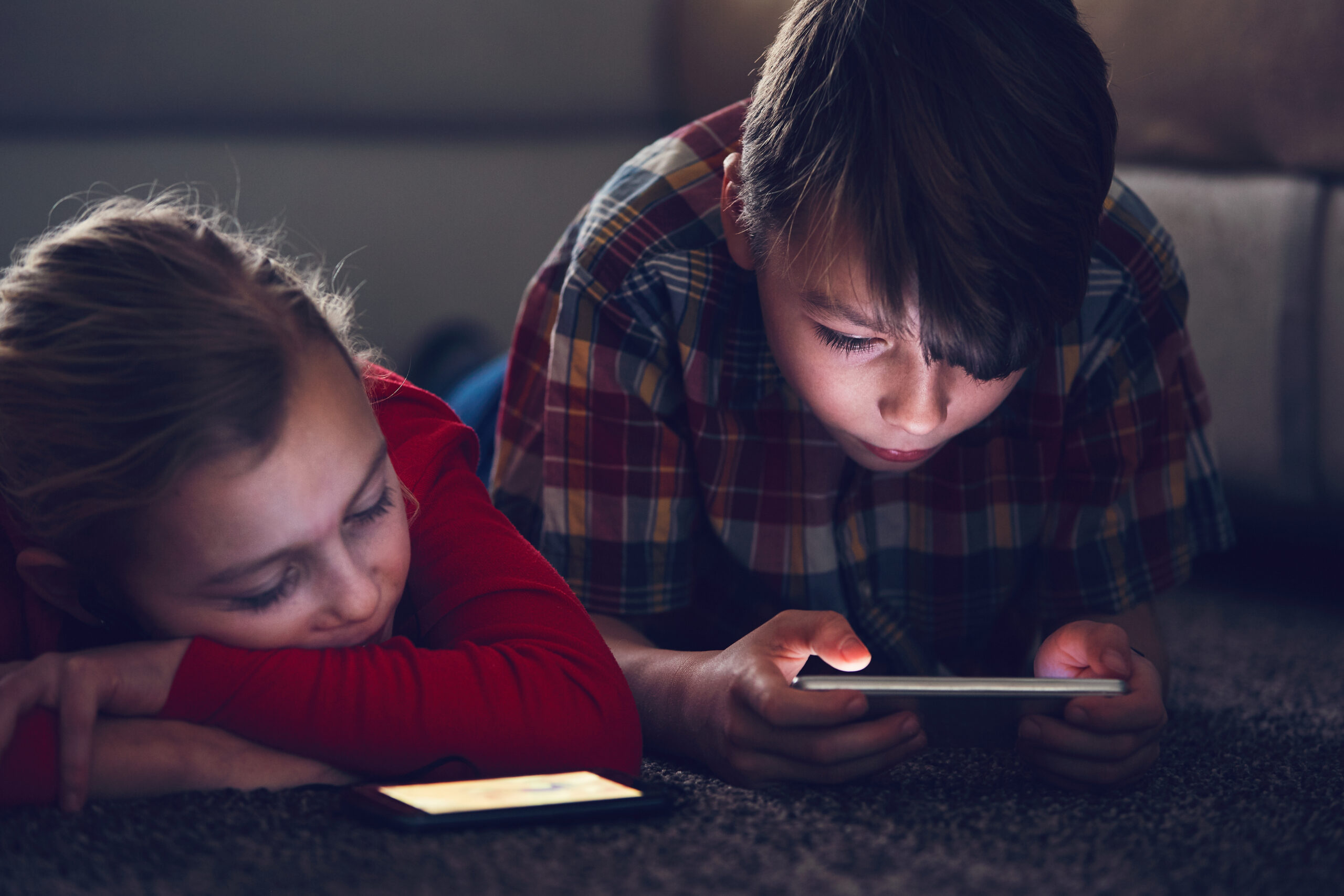 Little,Girl,And,Boy,Watching,Video,Or,Playing,Games,On