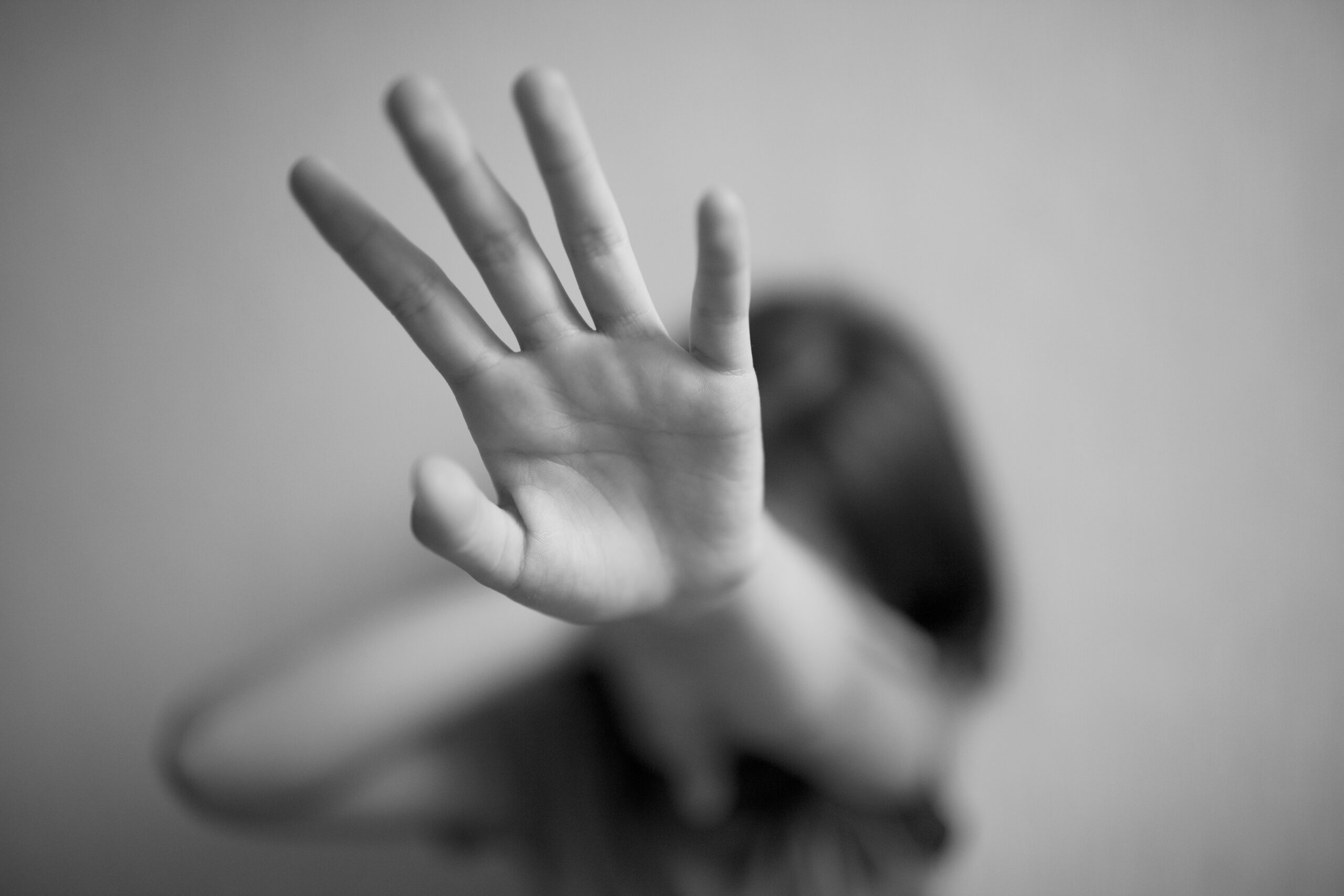 Little,Girl,Protects,Herself,With,Her,Hand