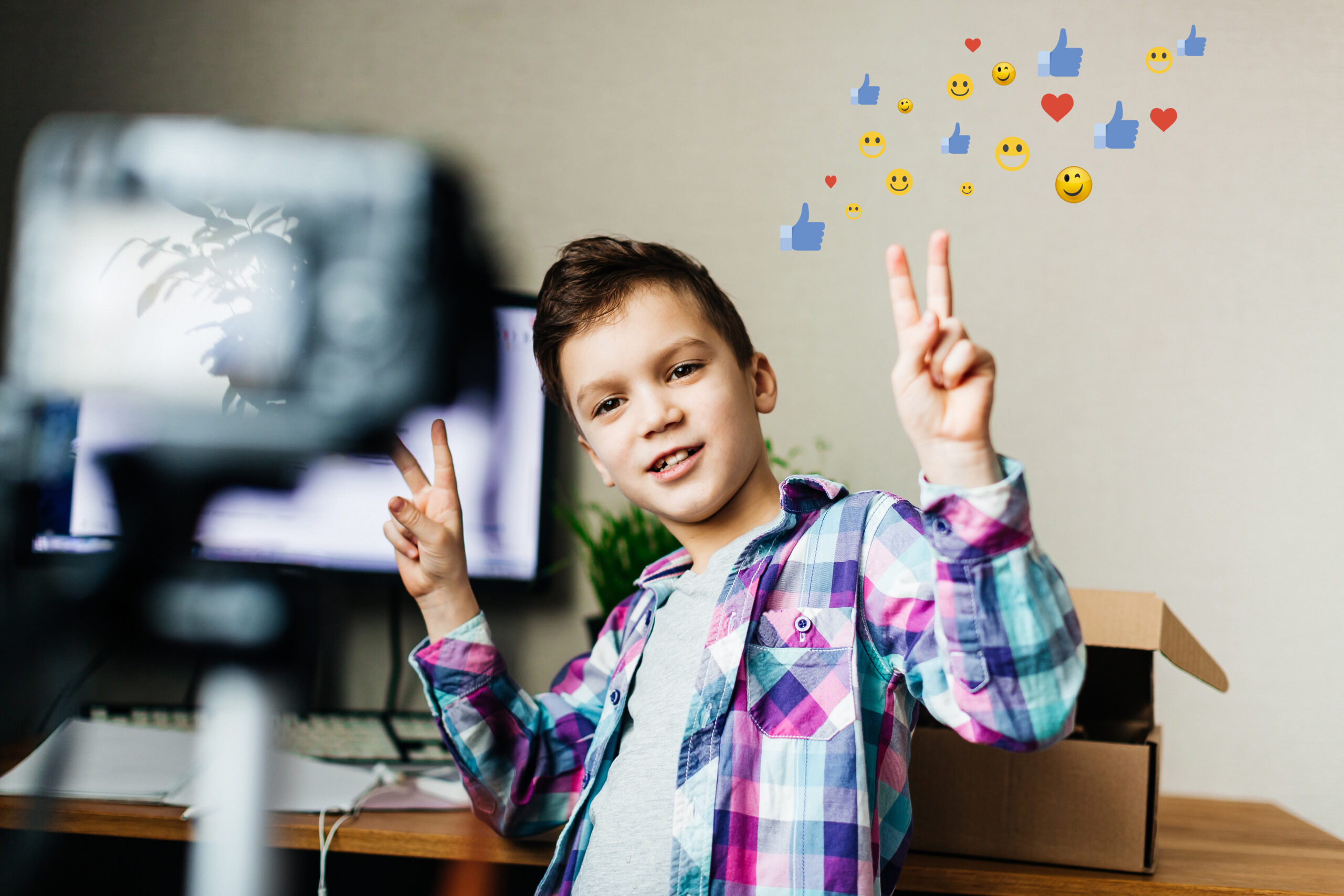 A,Child,Blogger,Takes,Pictures,Of,Himself,On,A,Camera,