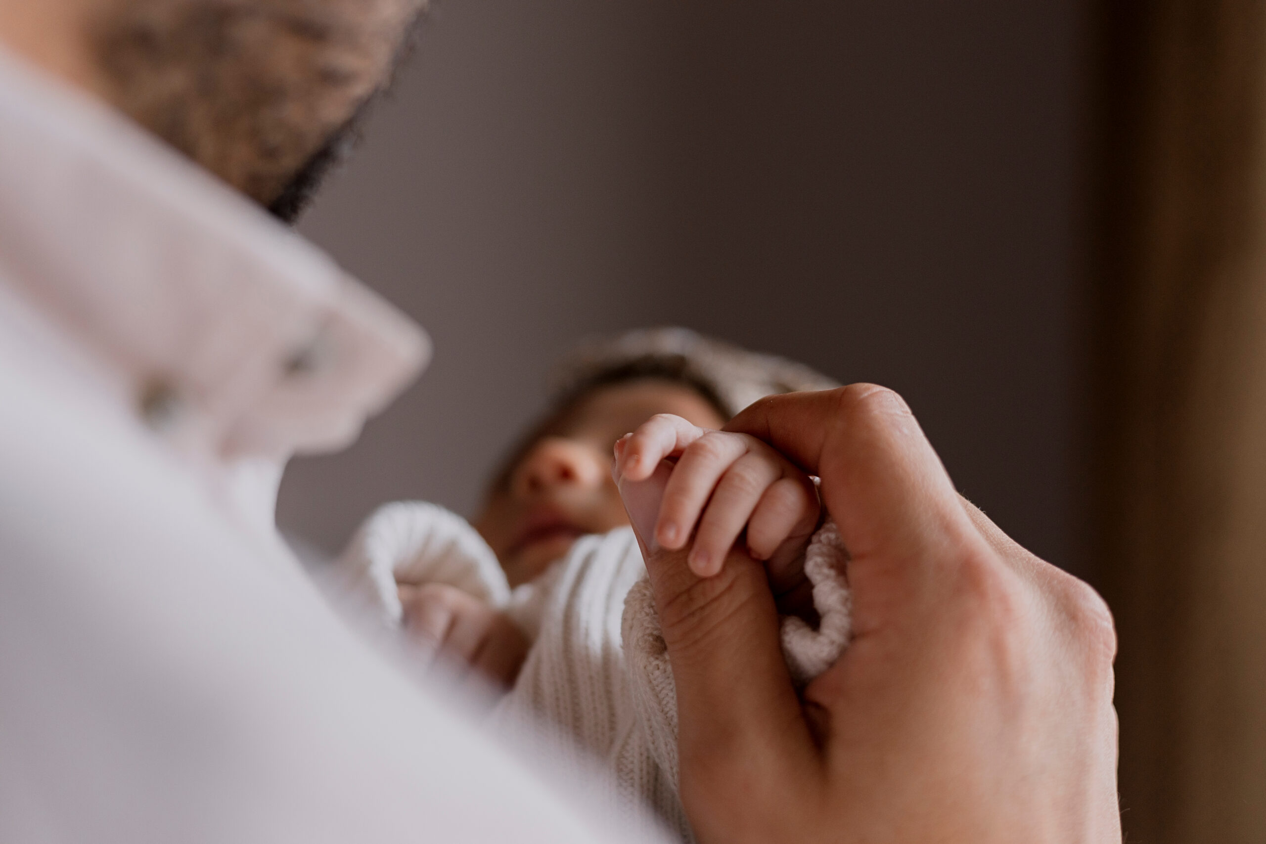 Close,Up,Of,Young,Father,Holding,The,Hand,Of,His